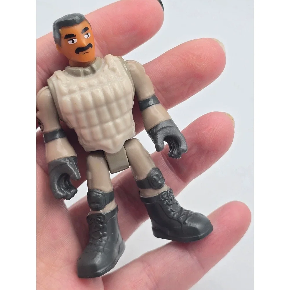 Imaginext Jurassic World Action Figure 3 Inch Grey Dino Worker Park Agent
